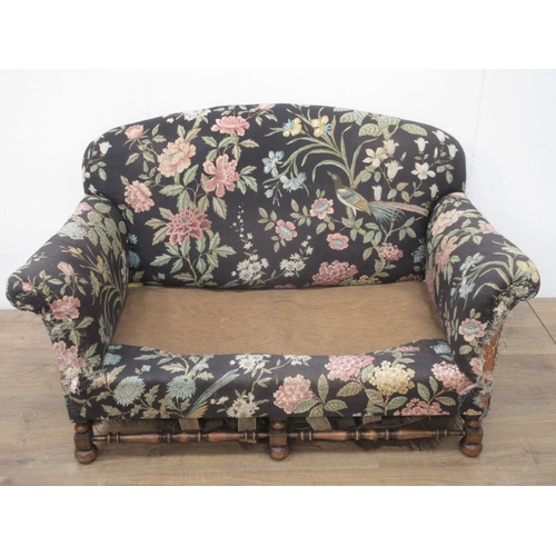 362 - A floral upholstered two seat Settee with turned and squared supports and stretchers, 5ft W, in need... 