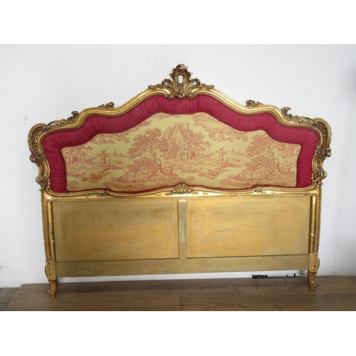 387 - A large upholstered Headboard with gilt scrolled frame, 6ft W