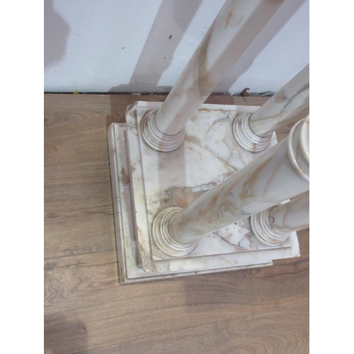 406 - A marble Torchere Stand with square top on four cylindrical columns on stepped base, 3ft 10in H, chi... 