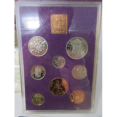 458 - A group of mostly GB Coin Sets cased in wooden box.