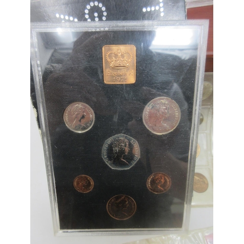 458 - A group of mostly GB Coin Sets cased in wooden box.