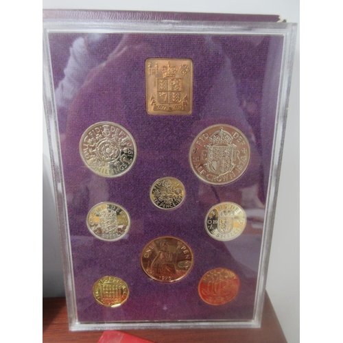 458 - A group of mostly GB Coin Sets cased in wooden box.