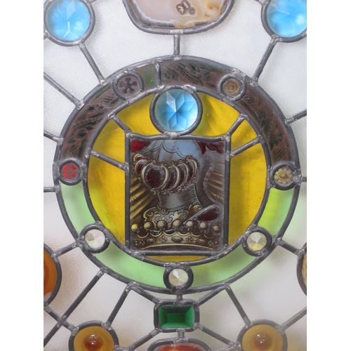 463 - A circular stained glass Window Panel with slices of mineral inserts.