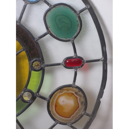 463 - A circular stained glass Window Panel with slices of mineral inserts.