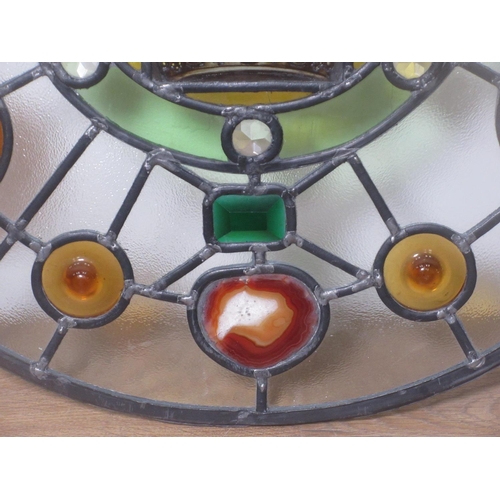 463 - A circular stained glass Window Panel with slices of mineral inserts.