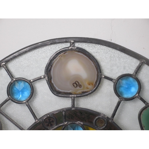 463 - A circular stained glass Window Panel with slices of mineral inserts.