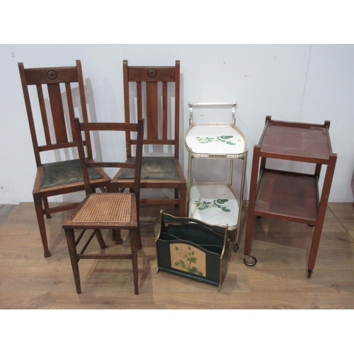 475 - A pair of oak Dining Chairs, a cane seated Chair, two Trollies, a Magazine Rack and a pottery Dish.