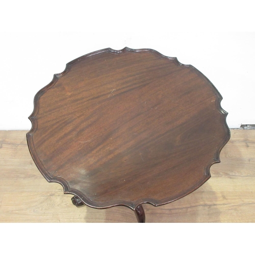 492 - A mahogany tilt top Table with piecrust top and tripod base 2ft diameter.