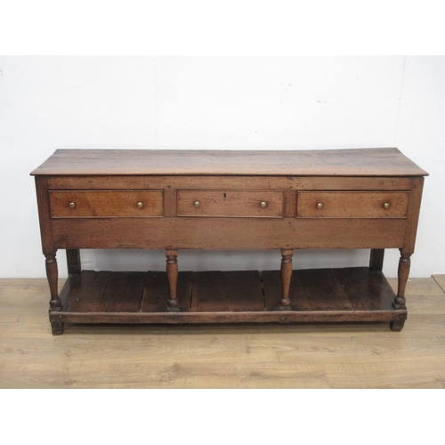 520 - An 18th Century oak Potboard Dresser fitted three drawers on turned supports 5ft 7in W.