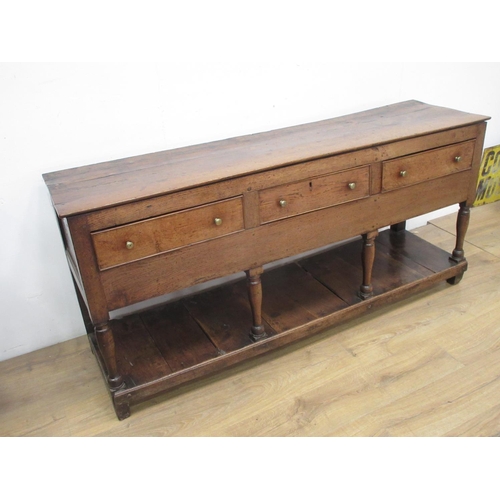 520 - An 18th Century oak Potboard Dresser fitted three drawers on turned supports 5ft 7in W.