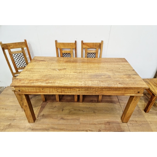 554 - A modern hardwood Dining Table and six Chairs with square supports 5ft 5in x 2ft 11in, one chair wit... 