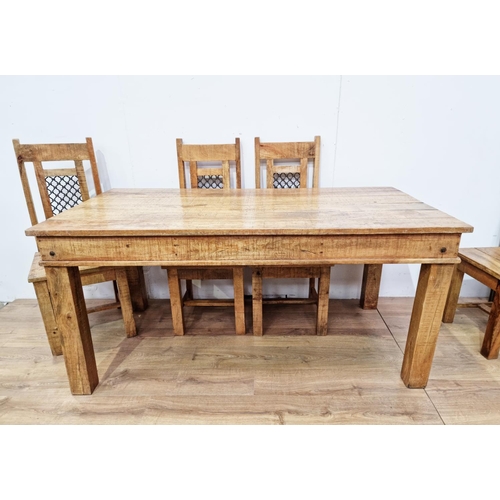 554 - A modern hardwood Dining Table and six Chairs with square supports 5ft 5in x 2ft 11in, one chair wit... 