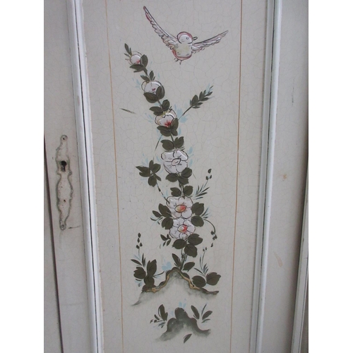 556 - A large painted five door Wardrobe the central door with cane panel above three drawers 8ft 5in W x ... 