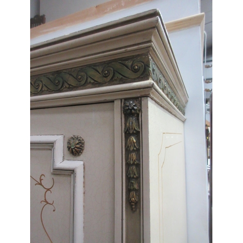 556 - A large painted five door Wardrobe the central door with cane panel above three drawers 8ft 5in W x ... 