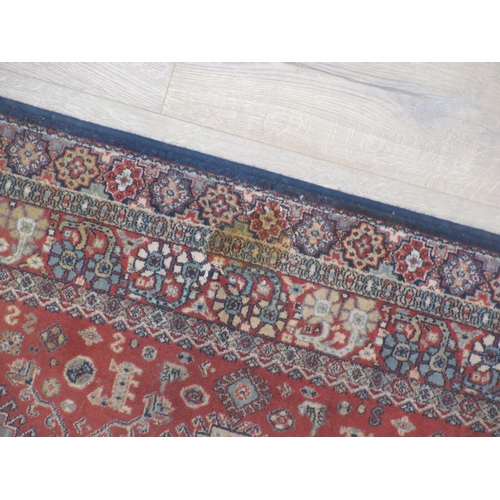 564 - A Persian style Runner with design of central lozenges on a red ground 8ft x 2ft 8in.