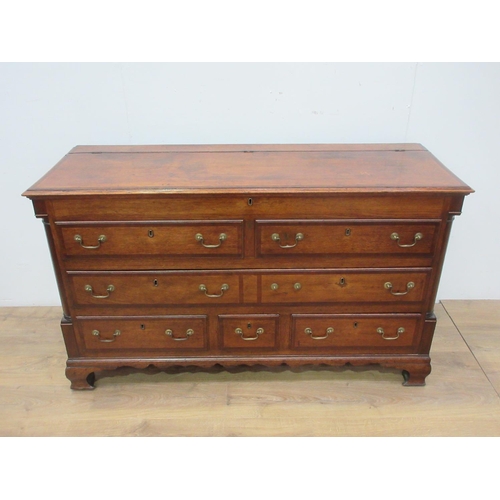 577 - An antique oak Lancashire Mule Chest cross banded in mahogany with hinged lid above two dummy and fo... 