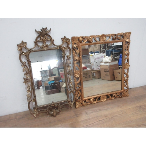 584 - A gilt-framed Wall Mirror with shell and scroll design 2ft 11in H x 2ft 7in W. and another (2)