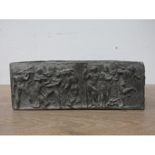 646 - A square lead Planter with friezes of merrymakers, 9in square.