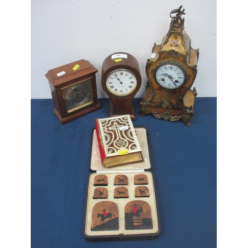 647 - Three Mantel Clocks, a French Bible and a cased set of hunting themed Place Settings.