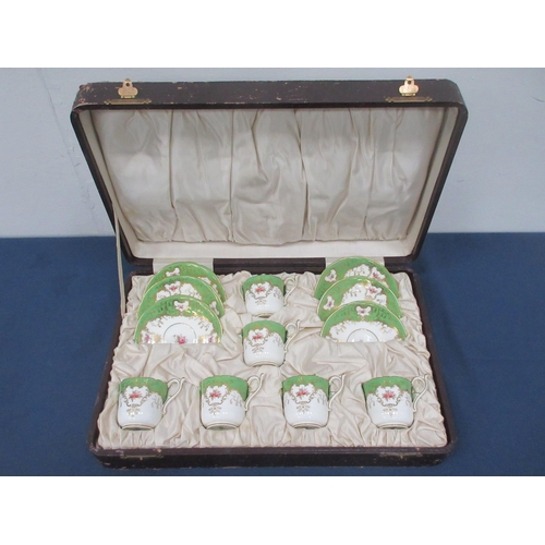 664 - A Coalport six piece Tea Set decorated floral sprays with apple green borders, one saucer A/F in fit... 