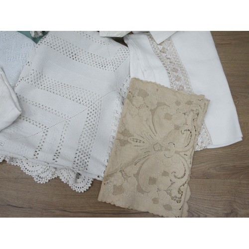 478 - A box of various Tablecloths including Victorian and Edwardian lace.