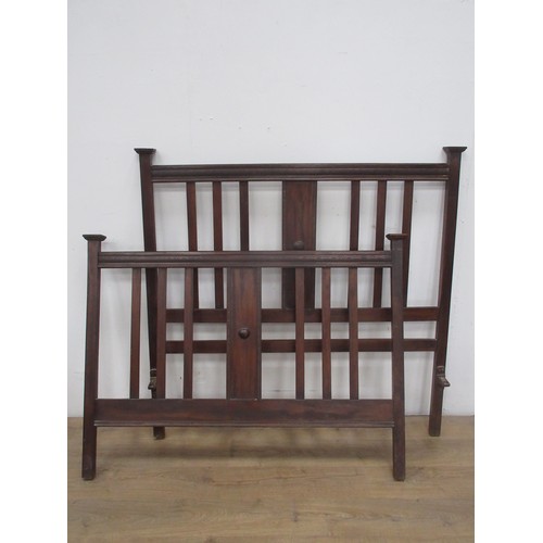 595 - A carved wooden Bedstead 4ft 6 W.