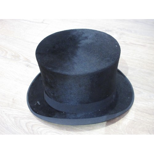 397 - A black Top Hat by Thomas Townsend & Co. 