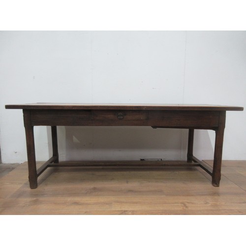 553 - An antique fruitwood top Refectory Table on oak base fitted two drawers on chamfered supports 6ft 11... 