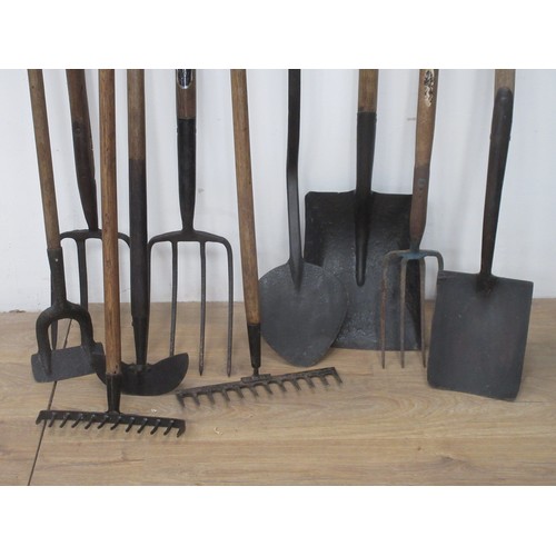 92 - A quantity of Garden Tools including forks, spades, rake etc