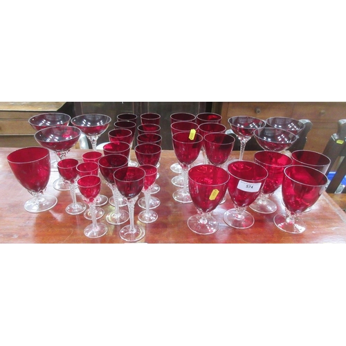 574 - A quantity of ruby Glassware with clear stems.