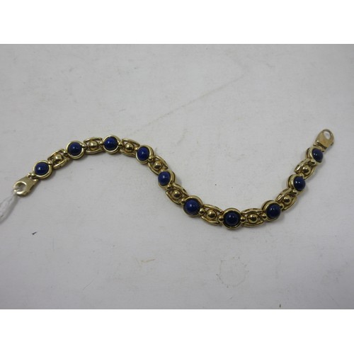 184 - A 9ct gold fancy link Bracelet set lapis lazuli beads, approx 15 gms all in.