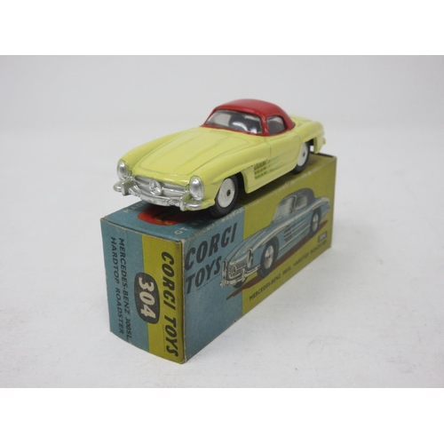 105 - A boxed Corgi Toys No.304 yellow Mercedes-Benz 300SL Hardtop Roadster