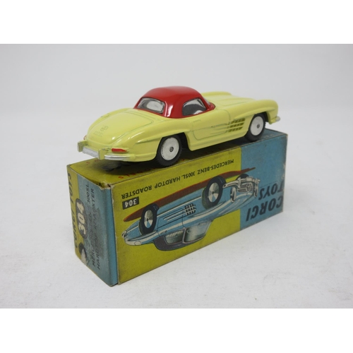 105 - A boxed Corgi Toys No.304 yellow Mercedes-Benz 300SL Hardtop Roadster