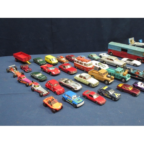 115 - A quantity of playworn Corgi and other diecast Vehicles including Car Transporter, Chipperfields Cir... 