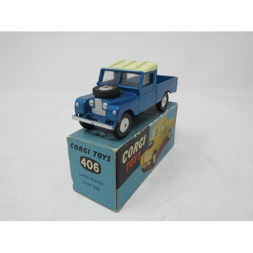 129 - A boxed Corgi Toys No.406 metallic blue 109