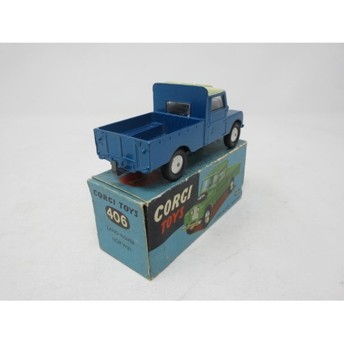 129 - A boxed Corgi Toys No.406 metallic blue 109