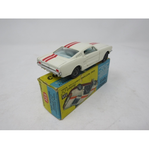 130 - A boxed Corgi Toys No.325 white Ford Mustang Fastback 2+2 Competition Model