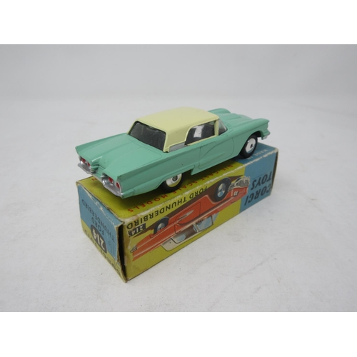 134 - A boxed Corgi Toys No.214 green and cream Ford Thunderbird