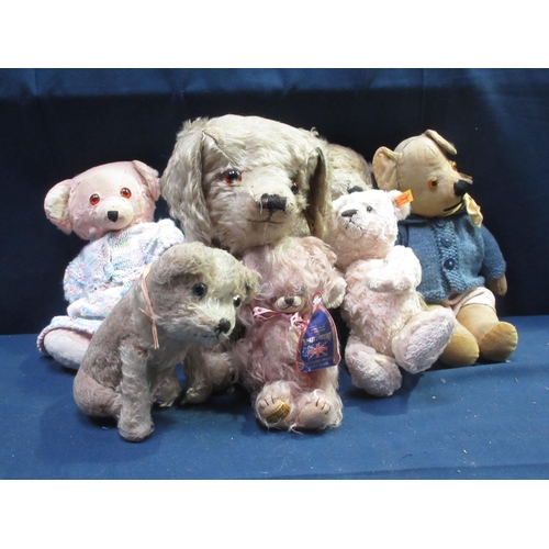 149 - Two dog Teddies, a 1960/70's Bear, a pink Teddy Bear, a modern Steiff Bear and a Merrythought Bear