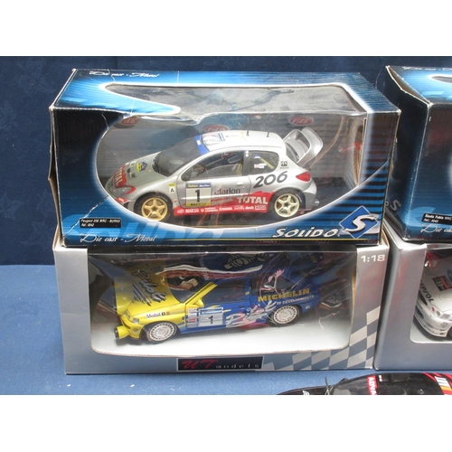 165 - Six boxed UT, Auto Art, Maisto and Solido 1/18 scale Rally Cars including Skoda Fabia WRC 2003, Peug... 