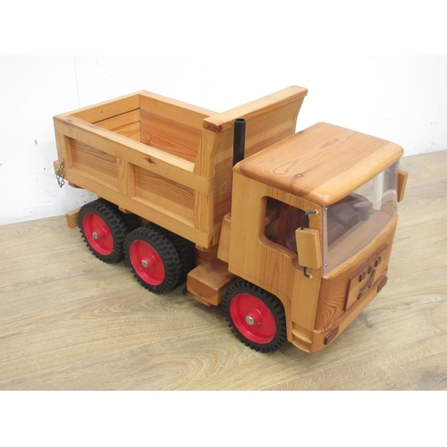 171 - A wooden scratch built model of a Man six-wheel Tipper Lorry by Richard Blizzard 2ft 4in L