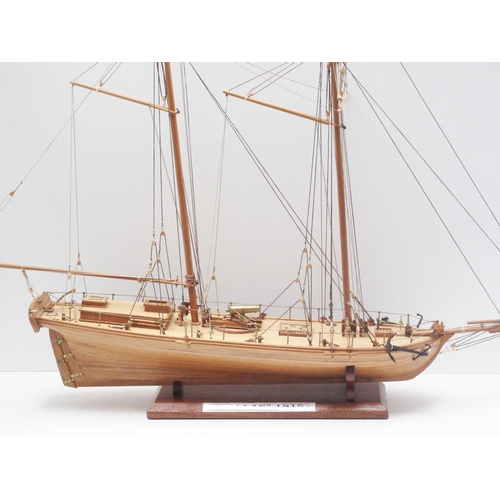 173 - A scratch built wooden model of a two masted Sailing Boat 'Dallas 1815' 2ft 4in L x 1ft 10in H in wh... 