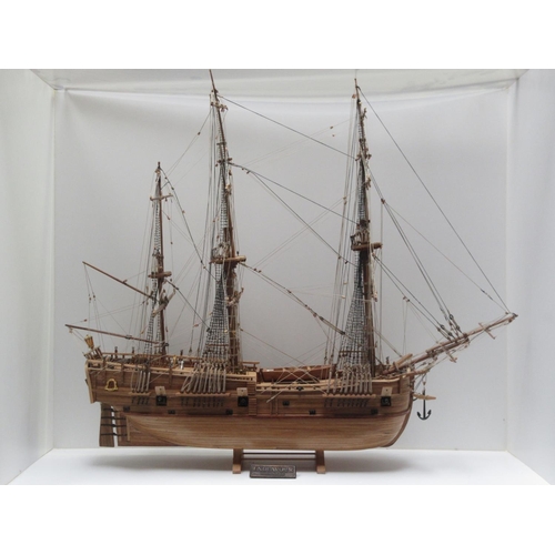 174 - A hand built wooden model of 'The Endeavour' three masted Galleon 2ft 8in L x 2ft 2in H in wooden ca... 