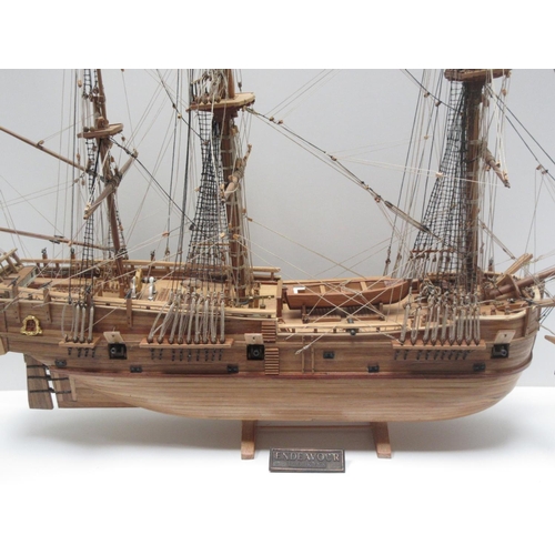 174 - A hand built wooden model of 'The Endeavour' three masted Galleon 2ft 8in L x 2ft 2in H in wooden ca... 