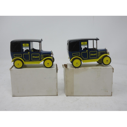 188 - Two plain boxed Dinky Toys Taxis