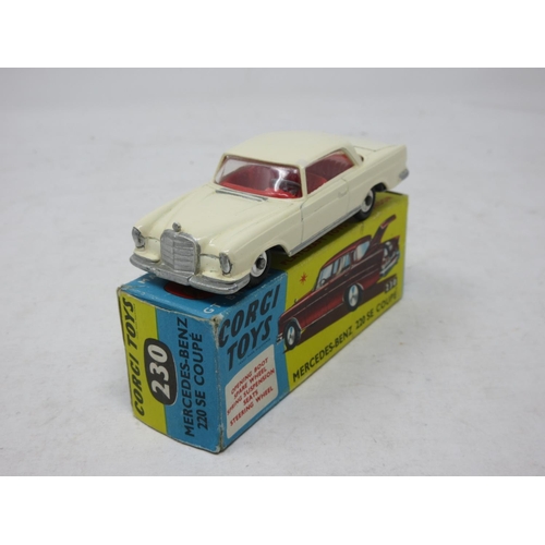 199 - A boxed Corgi Toys No.230 white Mercedes 220SE with spare wheel