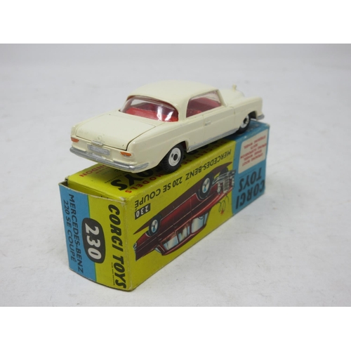 199 - A boxed Corgi Toys No.230 white Mercedes 220SE with spare wheel