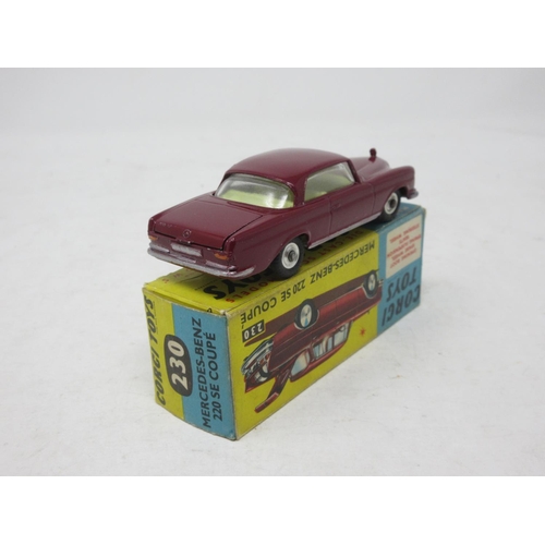 200 - A boxed Corgi Toys No.230 red Mercedes 220SE with spare tyre only