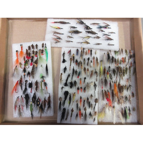 318 - A quantity of modern hand tied Trout Flies and Lures