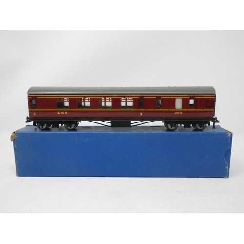 32 - Two boxed Hornby Dublo 3-rail L.M.S. Brake Coaches and a boxed 1/3 Class